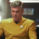 Anson Mount's Captain Christopher Pike sits in the captain's chair of the U.S.S. Enterprise.